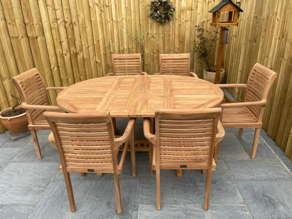 Teak Garden Dining Set. Table 6 chairs cushions and parasol.