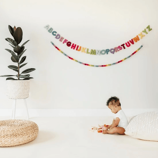 Wool felt letter garlands are an easy way to add a little color and ...