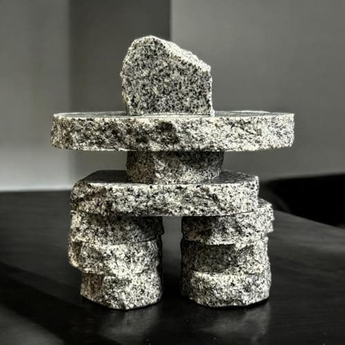 Three Wolf Original figures and a 4" H soapstone Inukshuk - Ward's Auctions